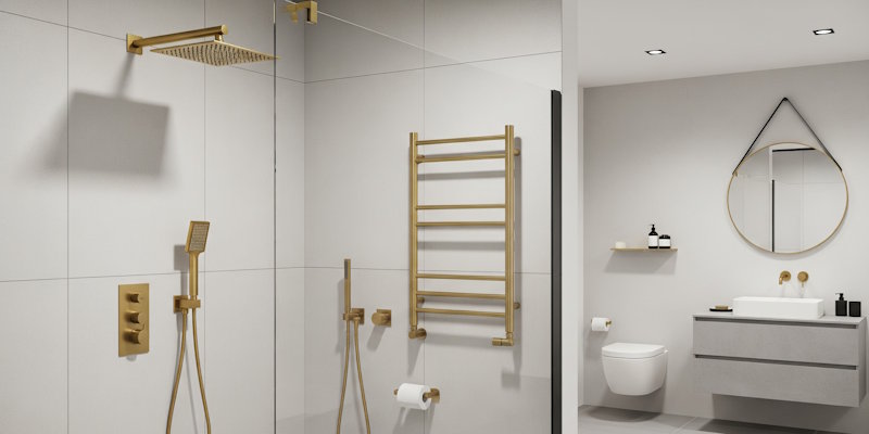 Close-up of brushed brass shower fittings